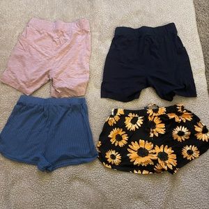 4 pairs of size medium shorts different styles